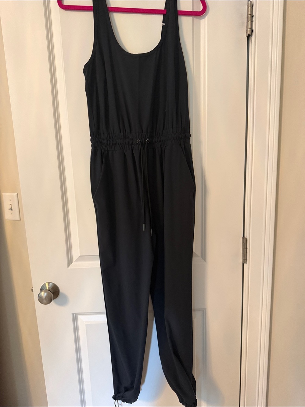 Women’s Black Sleeveless Jumpsuit with Drawstring Waist and an ankle
